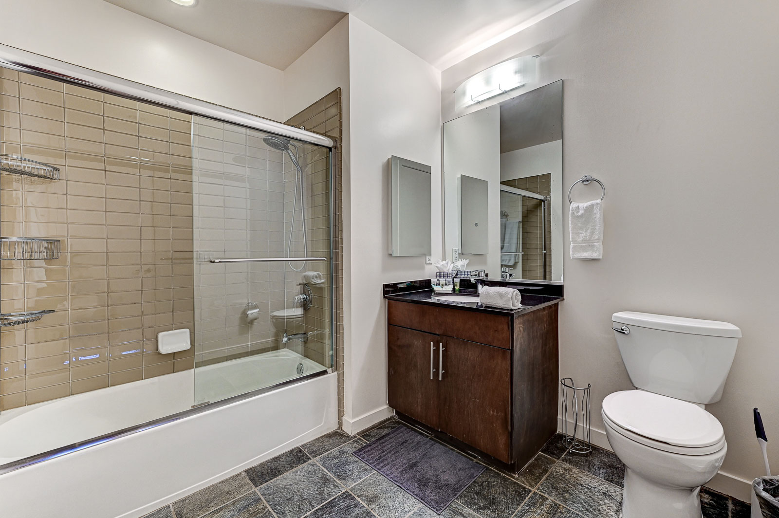Two-bedroom (possible 3-), two-bath, 4th floor condominium in The Juhl, located in the heart of Las Vegas, NV – the perfect location for any individual traveling for work or play. This spacious two-bedroom condominium not only boasts contemporary living but also extensive amenities to balance your stay.

Juhl is an artfully innovating new condominium in downtown Las Vegas, offering an exceptional collection of distinct residences designed to suit any lifestyle. Rather than conforming to any one model of living, Juhl provides a fresh, open canvas for individual expression. Clean, airy interiors provide limitless flexibility and transition seamlessly to private outdoor terraces. High ceilings and floor-to-ceiling windows maximize height, light and city / Sunset Strip views.

This residence is newly upgraded and professionally furnished. The open kitchen includes granite countertops, stainless steel appliances, custom tile backsplash and is fully equipped with housewares. In the building you can also enjoy cocktails on the Vino Deck (same floor as condo), work out at the gym, and watch a film in the alfresco movie theater. The complex is close to the Art District, Medical District, Smith Center, Las Vegas Academy of Arts and more. Ground-level shops & eateries, short distance to nightlife, public transportation. Parking for 1 vehicle included.
