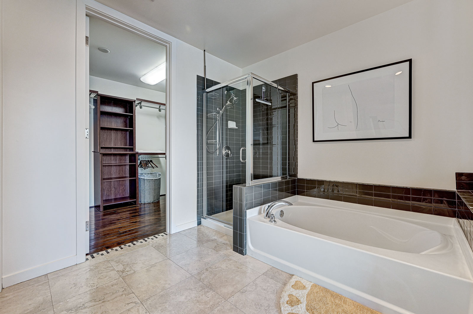 Two-bedroom (possible 3-), two-bath, 4th floor condominium in The Juhl, located in the heart of Las Vegas, NV – the perfect location for any individual traveling for work or play. This spacious two-bedroom condominium not only boasts contemporary living but also extensive amenities to balance your stay.

Juhl is an artfully innovating new condominium in downtown Las Vegas, offering an exceptional collection of distinct residences designed to suit any lifestyle. Rather than conforming to any one model of living, Juhl provides a fresh, open canvas for individual expression. Clean, airy interiors provide limitless flexibility and transition seamlessly to private outdoor terraces. High ceilings and floor-to-ceiling windows maximize height, light and city / Sunset Strip views.

This residence is newly upgraded and professionally furnished. The open kitchen includes granite countertops, stainless steel appliances, custom tile backsplash and is fully equipped with housewares. In the building you can also enjoy cocktails on the Vino Deck (same floor as condo), work out at the gym, and watch a film in the alfresco movie theater. The complex is close to the Art District, Medical District, Smith Center, Las Vegas Academy of Arts and more. Ground-level shops & eateries, short distance to nightlife, public transportation. Parking for 1 vehicle included.
