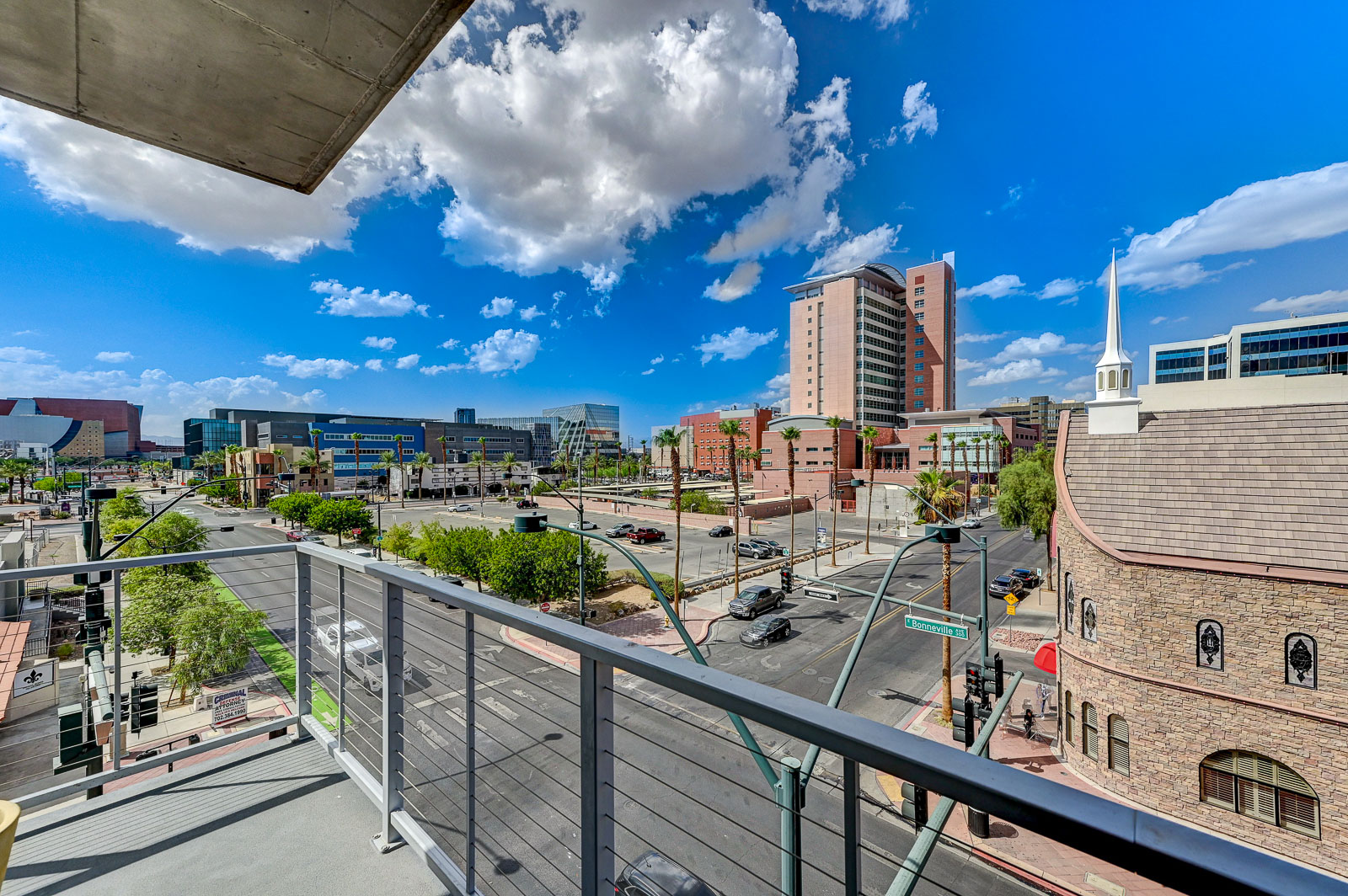 Two-bedroom (possible 3-), two-bath, 4th floor condominium in The Juhl, located in the heart of Las Vegas, NV – the perfect location for any individual traveling for work or play. This spacious two-bedroom condominium not only boasts contemporary living but also extensive amenities to balance your stay.

Juhl is an artfully innovating new condominium in downtown Las Vegas, offering an exceptional collection of distinct residences designed to suit any lifestyle. Rather than conforming to any one model of living, Juhl provides a fresh, open canvas for individual expression. Clean, airy interiors provide limitless flexibility and transition seamlessly to private outdoor terraces. High ceilings and floor-to-ceiling windows maximize height, light and city / Sunset Strip views.

This residence is newly upgraded and professionally furnished. The open kitchen includes granite countertops, stainless steel appliances, custom tile backsplash and is fully equipped with housewares. In the building you can also enjoy cocktails on the Vino Deck (same floor as condo), work out at the gym, and watch a film in the alfresco movie theater. The complex is close to the Art District, Medical District, Smith Center, Las Vegas Academy of Arts and more. Ground-level shops & eateries, short distance to nightlife, public transportation. Parking for 1 vehicle included.
