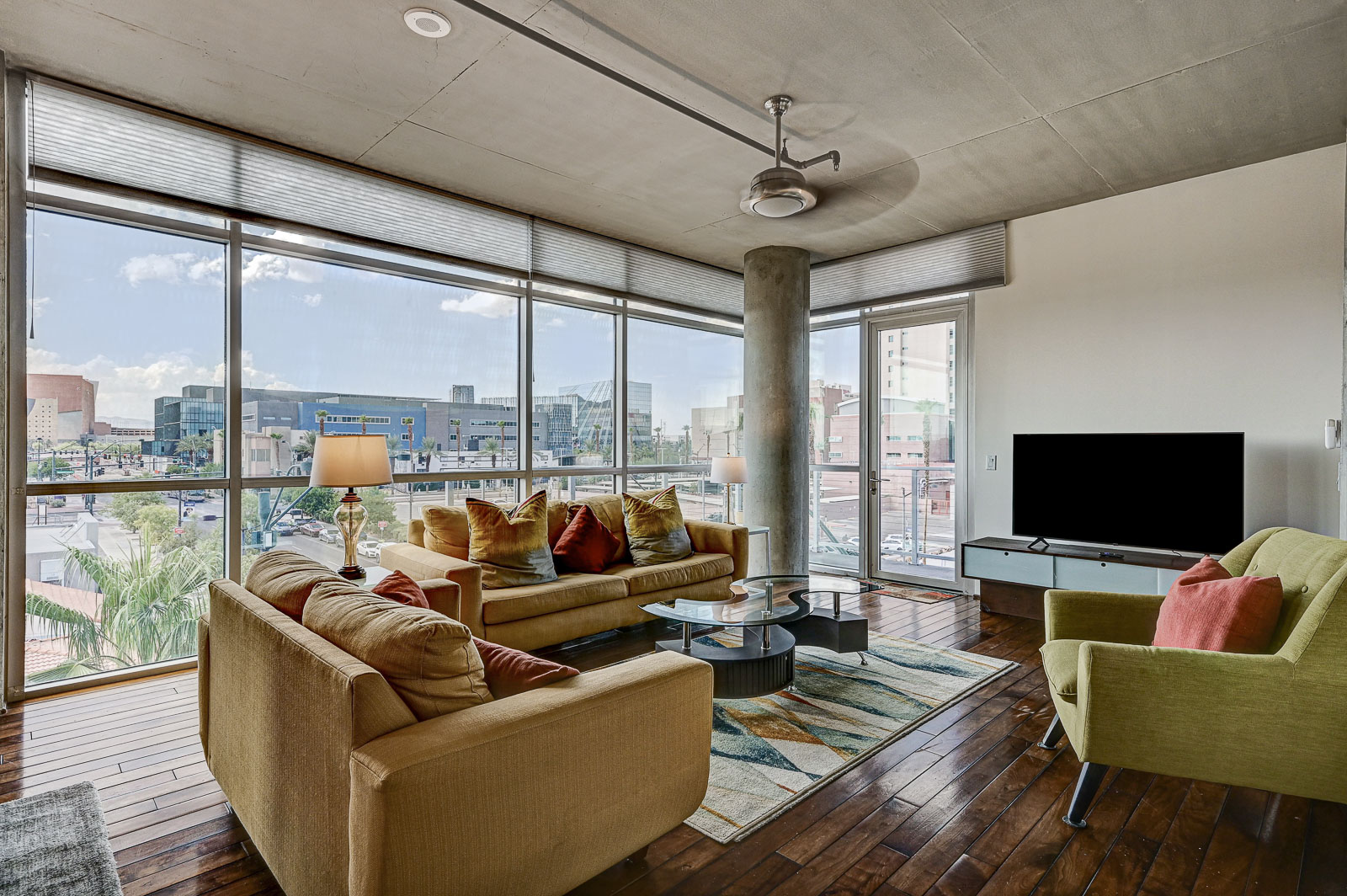 Two-bedroom (possible 3-), two-bath, 4th floor condominium in The Juhl, located in the heart of Las Vegas, NV – the perfect location for any individual traveling for work or play. This spacious two-bedroom condominium not only boasts contemporary living but also extensive amenities to balance your stay.

Juhl is an artfully innovating new condominium in downtown Las Vegas, offering an exceptional collection of distinct residences designed to suit any lifestyle. Rather than conforming to any one model of living, Juhl provides a fresh, open canvas for individual expression. Clean, airy interiors provide limitless flexibility and transition seamlessly to private outdoor terraces. High ceilings and floor-to-ceiling windows maximize height, light and city / Sunset Strip views.

This residence is newly upgraded and professionally furnished. The open kitchen includes granite countertops, stainless steel appliances, custom tile backsplash and is fully equipped with housewares. In the building you can also enjoy cocktails on the Vino Deck (same floor as condo), work out at the gym, and watch a film in the alfresco movie theater. The complex is close to the Art District, Medical District, Smith Center, Las Vegas Academy of Arts and more. Ground-level shops & eateries, short distance to nightlife, public transportation. Parking for 1 vehicle included.
