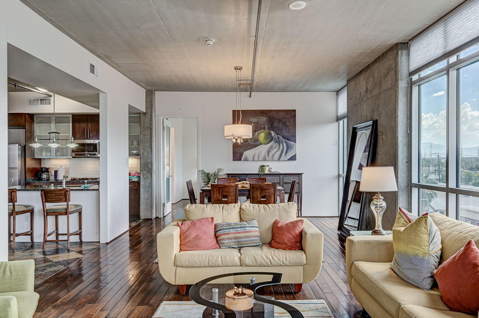 Two-bedroom (possible 3-), two-bath, 4th floor condominium in The Juhl, located in the heart of Las Vegas, NV – the perfect location for any individual traveling for work or play. This spacious two-bedroom condominium not only boasts contemporary living but also extensive amenities to balance your stay.

Juhl is an artfully innovating new condominium in downtown Las Vegas, offering an exceptional collection of distinct residences designed to suit any lifestyle. Rather than conforming to any one model of living, Juhl provides a fresh, open canvas for individual expression. Clean, airy interiors provide limitless flexibility and transition seamlessly to private outdoor terraces. High ceilings and floor-to-ceiling windows maximize height, light and city / Sunset Strip views.

This residence is newly upgraded and professionally furnished. The open kitchen includes granite countertops, stainless steel appliances, custom tile backsplash and is fully equipped with housewares. In the building you can also enjoy cocktails on the Vino Deck (same floor as condo), work out at the gym, and watch a film in the alfresco movie theater. The complex is close to the Art District, Medical District, Smith Center, Las Vegas Academy of Arts and more. Ground-level shops & eateries, short distance to nightlife, public transportation. Parking for 1 vehicle included.
