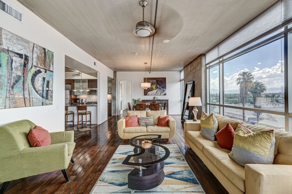Two-bedroom (possible 3-), two-bath, 4th floor condominium in The Juhl, located in the heart of Las Vegas, NV – the perfect location for any individual traveling for work or play. This spacious two-bedroom condominium not only boasts contemporary living but also extensive amenities to balance your stay.

Juhl is an artfully innovating new condominium in downtown Las Vegas, offering an exceptional collection of distinct residences designed to suit any lifestyle. Rather than conforming to any one model of living, Juhl provides a fresh, open canvas for individual expression. Clean, airy interiors provide limitless flexibility and transition seamlessly to private outdoor terraces. High ceilings and floor-to-ceiling windows maximize height, light and city / Sunset Strip views.

This residence is newly upgraded and professionally furnished. The open kitchen includes granite countertops, stainless steel appliances, custom tile backsplash and is fully equipped with housewares. In the building you can also enjoy cocktails on the Vino Deck (same floor as condo), work out at the gym, and watch a film in the alfresco movie theater. The complex is close to the Art District, Medical District, Smith Center, Las Vegas Academy of Arts and more. Ground-level shops & eateries, short distance to nightlife, public transportation. Parking for 1 vehicle included.
