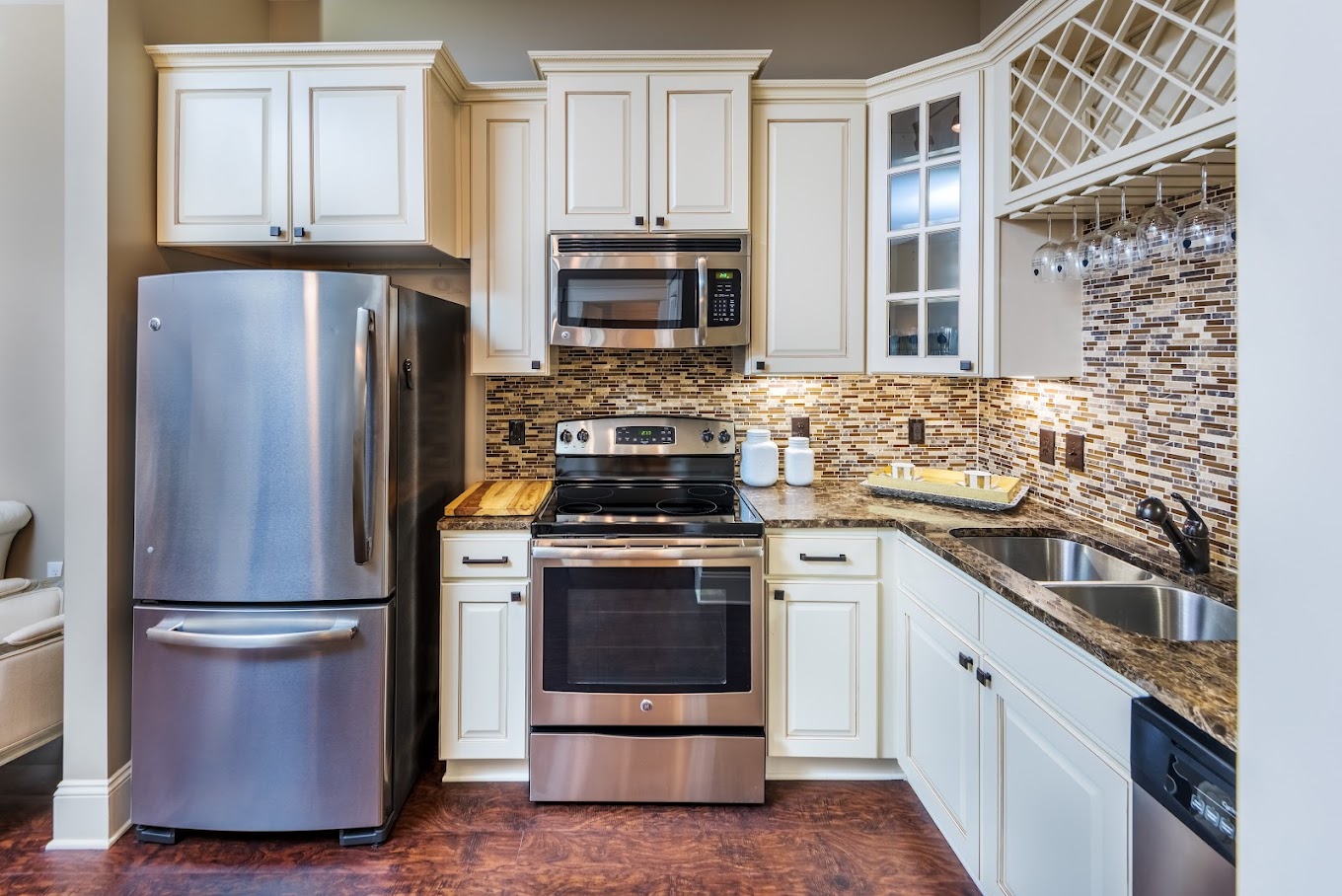 Luxury Plank Flooring, Marble Countertops, Large Islands, Custom Cabinetry, Oil Rubbed Bronze Finishes, Stainless Steel Appliances, Kitchen Pantries
