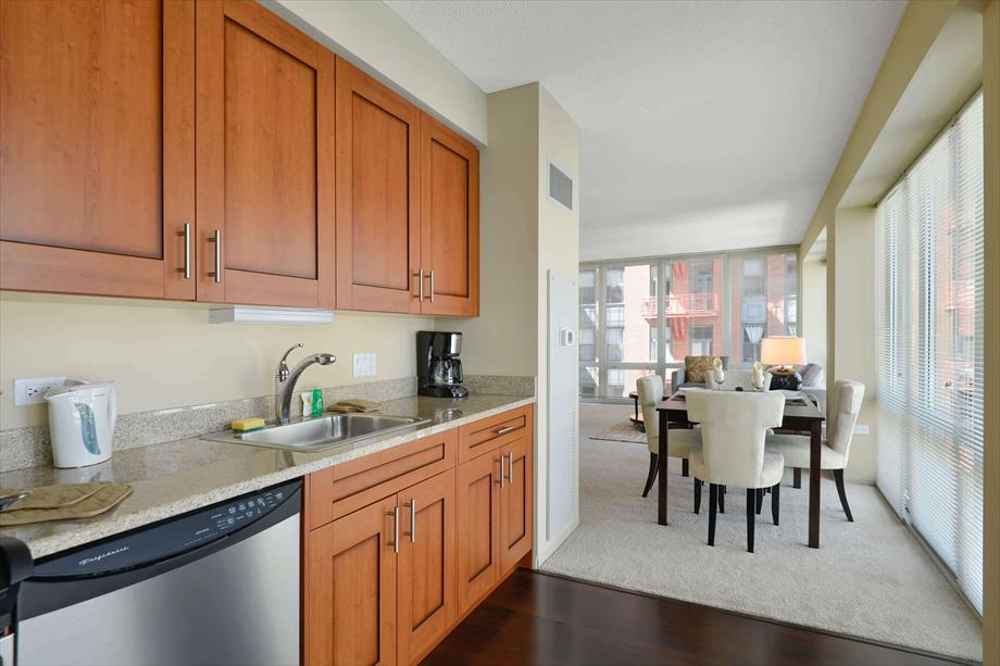 Stainless Steel Appliances, Rich Granite Countertops, Cherry Cabinets with Designer Hardware