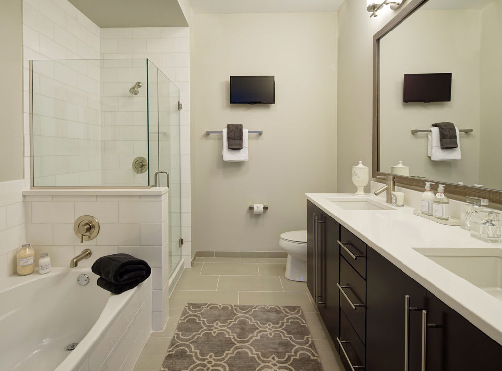 Granite Countertops, Separate Tubs and Showers, Designer Tile Bathroom Flooring and Surrounds