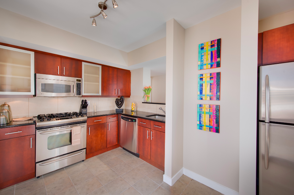 Flat Panel Cabinetry, Granite Countertops, Gas Cooking, Stainless Steel Appliances