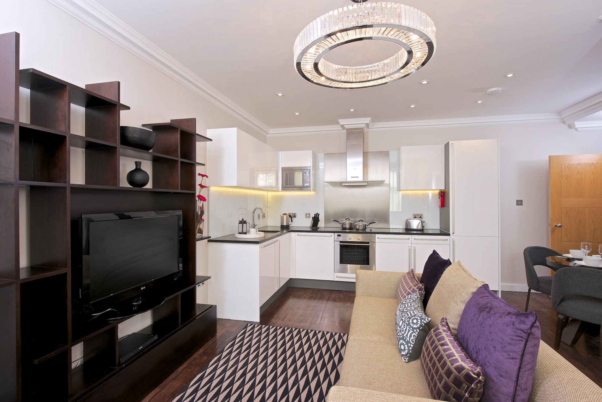 img Fraser Suites Kensington London 1 Bedroom Deluxe Kitchen Living Area AvenueWest Global