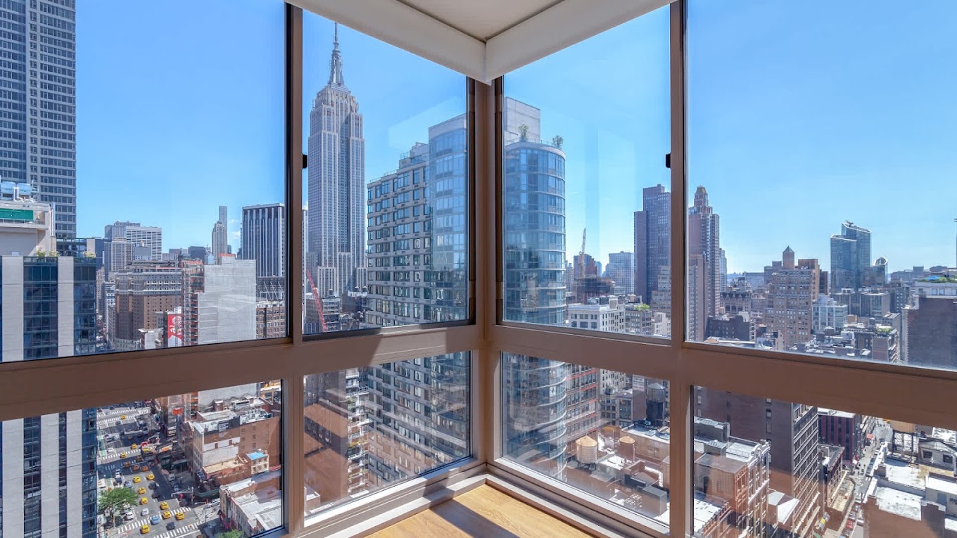 Floor to ceiling windows, large square foot, river and city views, hard surface flooring 