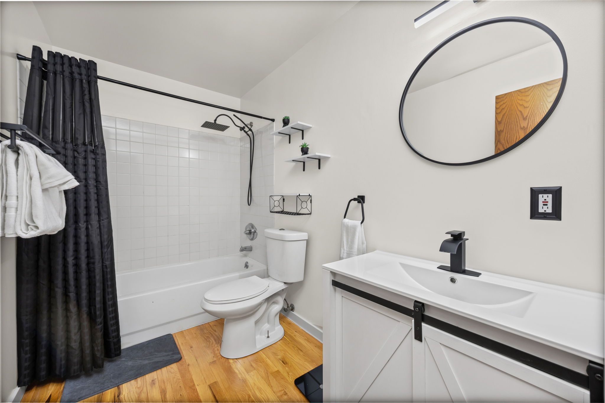 This fully furnished 1 bedroom, 1.5 bathroom condo is located in the sought-after Arapahoe SkyLofts, right in the heart of Denver. Offering 1,124 square feet of thoughtfully designed living space, this home blends modern loft-style character with comfort and convenience.
 
The condo features hardwood floors, concrete walls, and exposed ductwork, creating a clean, contemporary industrial aesthetic. The open living area flows seamlessly into the dining space, which includes seating for four, plus two bar stools at the kitchen counter, making it ideal for entertaining or casual meals.
 
The spacious primary bedroom is furnished with a king bed and provides a quiet retreat. The primary bathroom includes a tub/shower combination, while a convenient half-bath powder room is located off the main living area—perfect for guests. An in-unit washer and dryer adds everyday convenience.
 
Step out onto the private balcony and enjoy views of downtown Denver, a perfect spot for morning coffee or evening relaxation.
 
Parking is a rare downtown luxury, and this unit includes two parking spaces in the attached garage—one suitable for a compact vehicle and the other for a full-size car.
 
Built in 1983, Arapahoe SkyLofts is ideally situated near Union Station and Coors Field, with easy access to downtown office buildings, public transportation, and major roadways. The neighborhood offers an abundance of restaurants, coffee shops, and retail options, all within close proximity.
 
This fully furnished condo provides an exceptional opportunity to enjoy urban living with space, style, and convenience in one of Denver’s most vibrant locations.