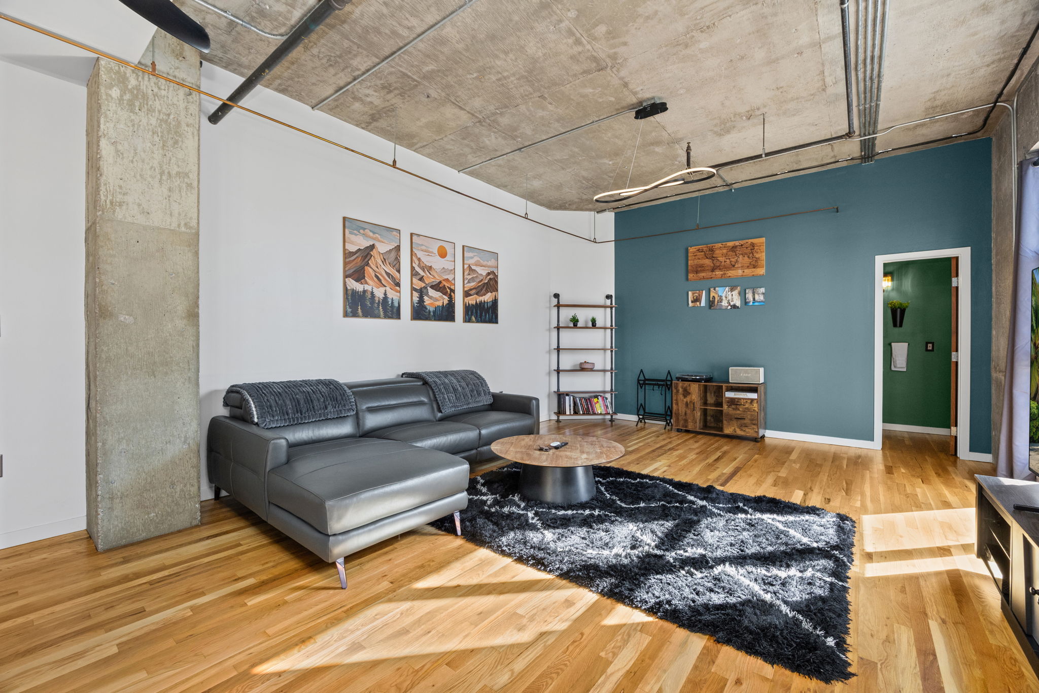 This fully furnished 1 bedroom, 1.5 bathroom condo is located in the sought-after Arapahoe SkyLofts, right in the heart of Denver. Offering 1,124 square feet of thoughtfully designed living space, this home blends modern loft-style character with comfort and convenience.
 
The condo features hardwood floors, concrete walls, and exposed ductwork, creating a clean, contemporary industrial aesthetic. The open living area flows seamlessly into the dining space, which includes seating for four, plus two bar stools at the kitchen counter, making it ideal for entertaining or casual meals.
 
The spacious primary bedroom is furnished with a king bed and provides a quiet retreat. The primary bathroom includes a tub/shower combination, while a convenient half-bath powder room is located off the main living area—perfect for guests. An in-unit washer and dryer adds everyday convenience.
 
Step out onto the private balcony and enjoy views of downtown Denver, a perfect spot for morning coffee or evening relaxation.
 
Parking is a rare downtown luxury, and this unit includes two parking spaces in the attached garage—one suitable for a compact vehicle and the other for a full-size car.
 
Built in 1983, Arapahoe SkyLofts is ideally situated near Union Station and Coors Field, with easy access to downtown office buildings, public transportation, and major roadways. The neighborhood offers an abundance of restaurants, coffee shops, and retail options, all within close proximity.
 
This fully furnished condo provides an exceptional opportunity to enjoy urban living with space, style, and convenience in one of Denver’s most vibrant locations.